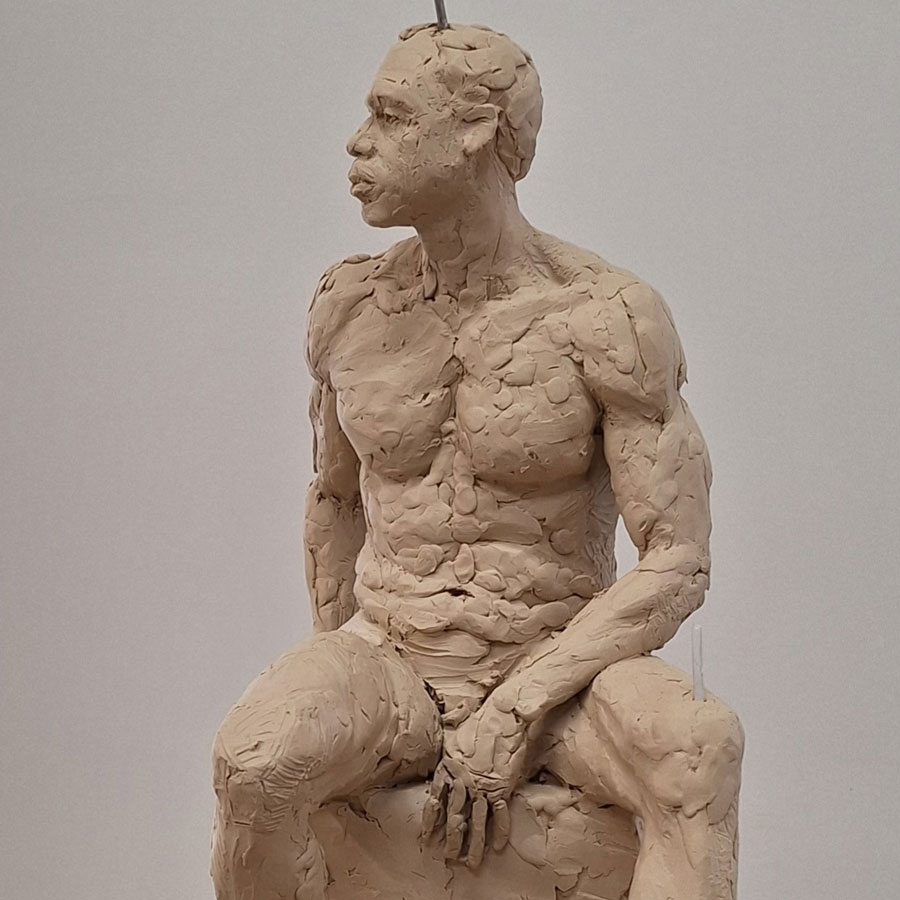 Seated figure